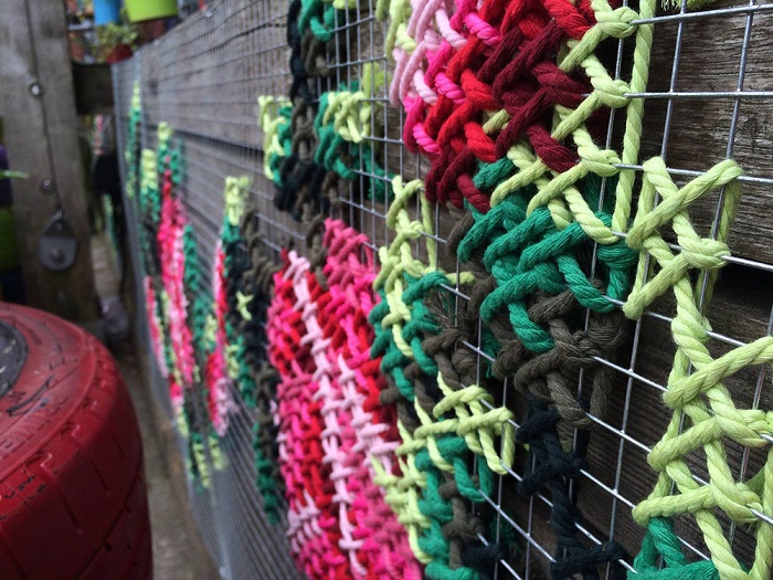 Cross stitch installation by Raquel Rodrigo