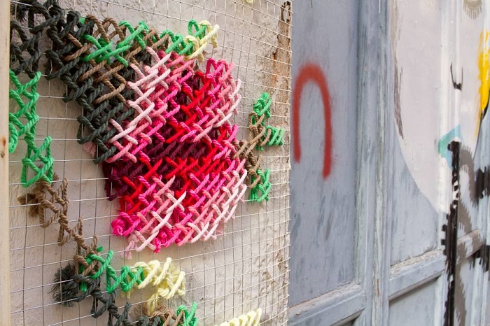 Cross stitch installation by Raquel Rodrigo